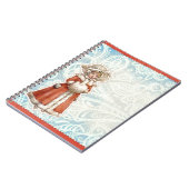 毛皮の赤のコートのビクトリアンなクリスマスの女の子 ノートブック (左側)