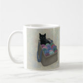 毛糸の袋の中の黒猫 コーヒーマグカップ (左)