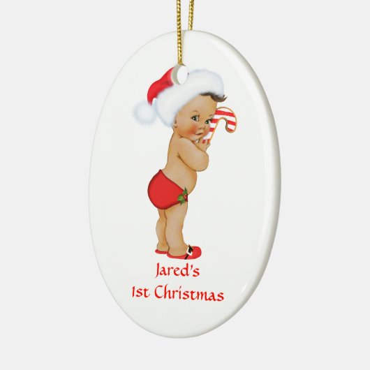 民族の男の赤ちゃんの初めてのクリスマスの赤いサンタの帽子 セラミックオーナメント (左)