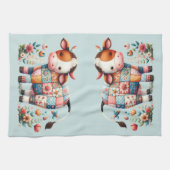 気まぐれなパッチワークの牛に花のアクセント キッチンタオル (横)