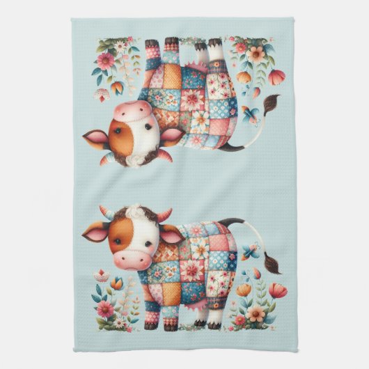 気まぐれなパッチワークの牛に花のアクセント キッチンタオル (縦)