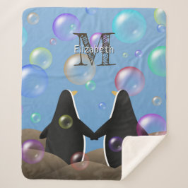 気泡を見ているフリッパーを持つペンギン シェルパブランケット