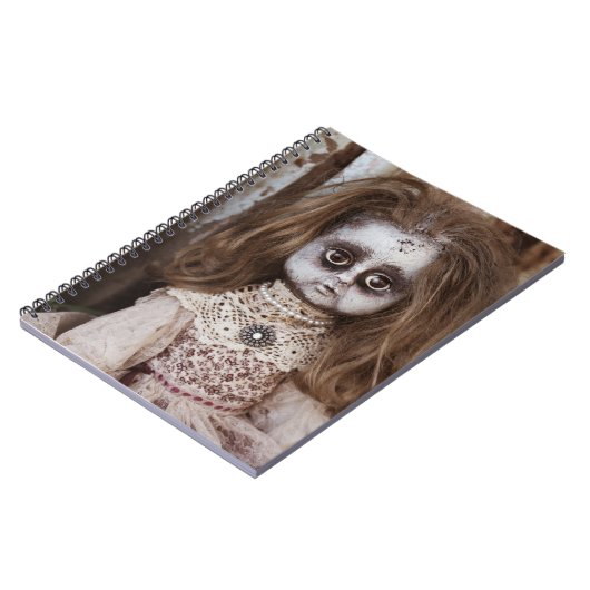 気色悪いゴシック様式磁器の人形のビクトリア時代の人のゴシック ノートブック (左側)