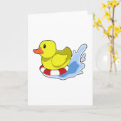 水で泳ぐ輪をつけたアヒルのPNG カード (黄色い花)