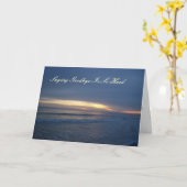 水の上の美しい夕日 カード (黄色い花)