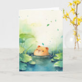 水の中からのカピバラの遊び心のあるのぞき見 カード (黄色い花)