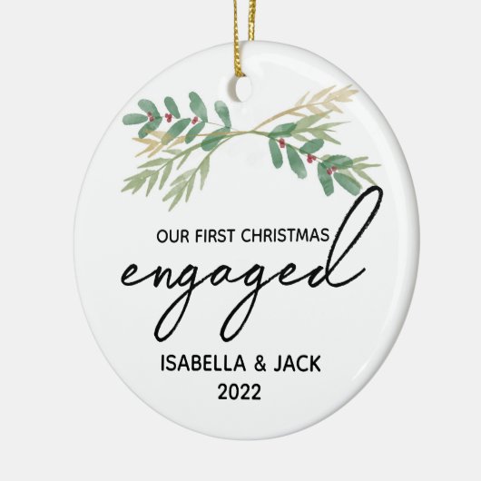 水の色の緑の私たちの初めてのクリスマス 婚約した セラミックオーナメント (左)
