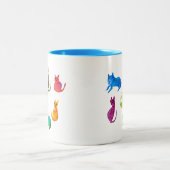 水カラフル熱狂する色の猫 ツートーンマグカップ (中央)