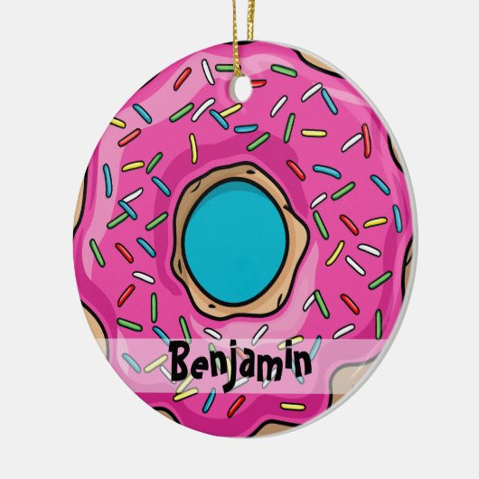 水分が多くおいしいピンクによって振りかけられるドーナツ セラミックオーナメント (左)