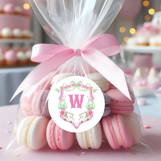 水彩ピンク&グリーンゴルフカートのモノグラムクレスト ラウンドシール