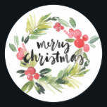 水彩松とホリーリースメリークリスマス ラウンドシール<br><div class="desc">メリークリスマス!このホリデーシールで封筒とギフトを完成させる。筆の書道を施した水彩のホリーリースを特徴とする。このクリスマスステッカーは封筒用シールとしても完璧だ。一致するアイテムが使用可能。</div>