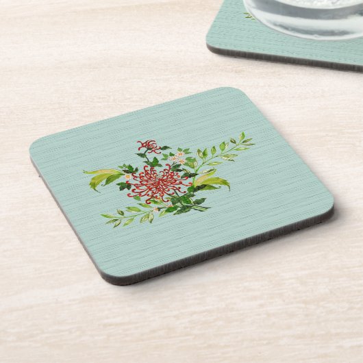 水彩赤いガーベラデイジーと緑のプラスチック コースター (左側)