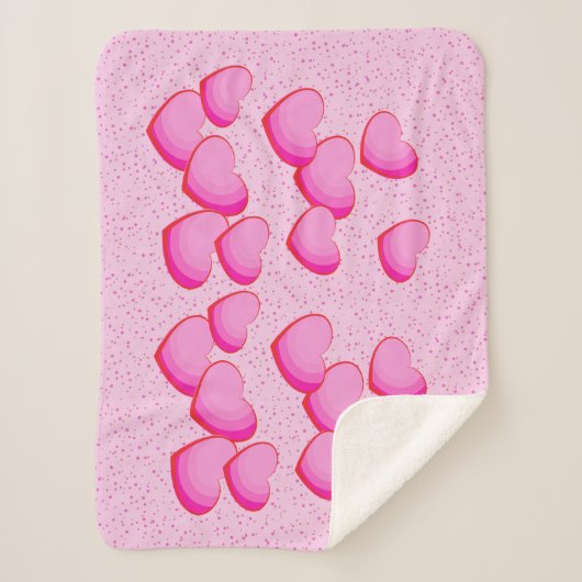 水玉模様上の明るいかわいらしピンクのハートのクラスタ シェルパブランケット (正面)