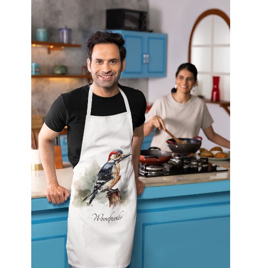 水色で竿に座っているキツツキ エプロン