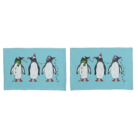 水色の背景にいる3羽のクリスマスのペンギン 枕カバー (フロントセット)