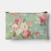 水色の背景にバラのピンク アクセサリーポーチ (正面)