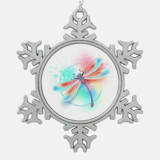 水色の背景に赤いトンボ スノーフレークピューターオーナメント (正面)