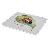 水色の葉に座っ鮮やかているテンジウムシ カッティングボード (角)