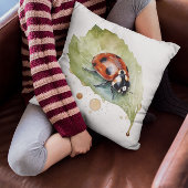 水色の葉に座っ鮮やかているテンジウムシ クッション