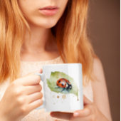 水色の葉に座っ鮮やかているテンジウムシ コーヒーマグカップ