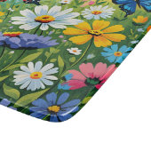 水色の鮮やか春の花パターン カッティングボード (角)