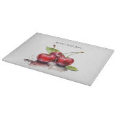 水色の3つの赤いジューシーなさくらんぼ カッティングボード (角)