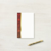 汚いヴィンテージの金ゴールドのクリスマス ポストイット (デスク上)