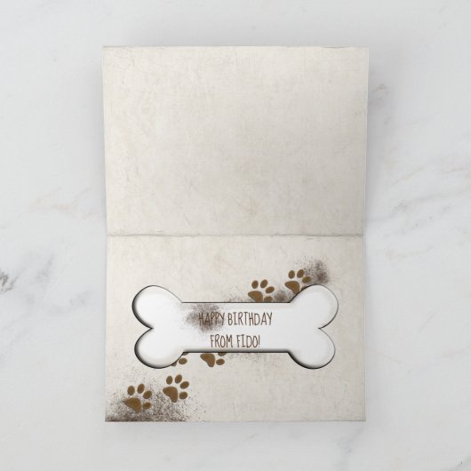 汚い犬の手のプリントと骨の誕生日 カード (内部)