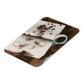 汚れた本と豆が入った熱いコーヒー マグネット (左側)