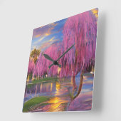 池のそばの夕暮れ時のピンクの柳 スクエア壁時計 (傾斜)