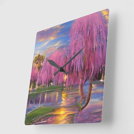 池のそばの夕暮れ時のピンクの柳 スクエア壁時計 (傾斜)