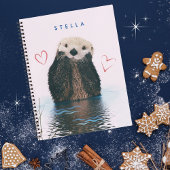 池の可愛いカワウソ背景とハート ノートブック