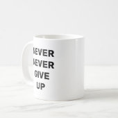 決して上に与えない コーヒーマグカップ (正面左)