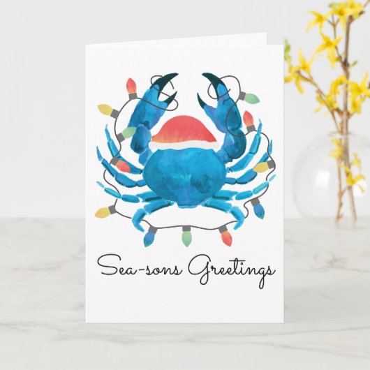 沿岸ビーチのクリスマスの青カニの休日サンタ カード (黄色い花)