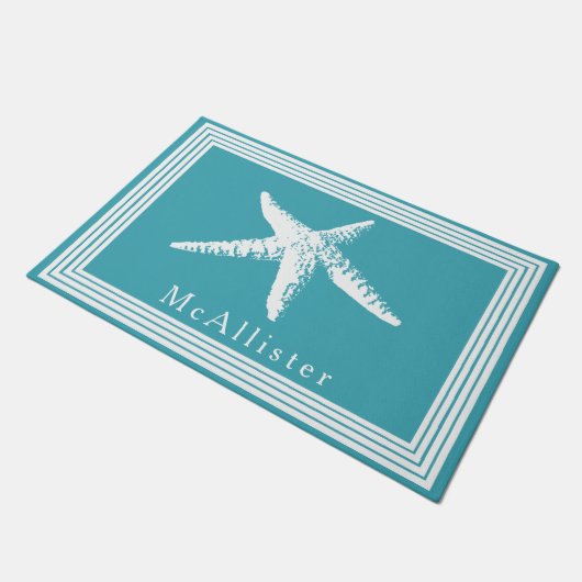 沿岸白いヒトデはフレーム及び海の青を並べます ドアマット (アングル)