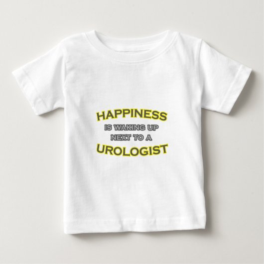 泌尿器科医の隣で幸せが起きている ベビーTシャツ (正面)