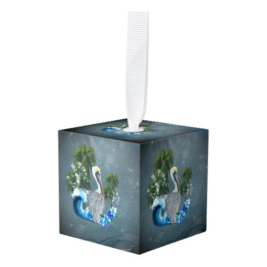 波とヤシの木が植えられた素晴らしいペリカン キューブオーナメント (正面アングル)
