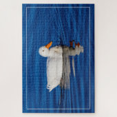 波打った水に小さな白いアヒル ジグソーパズル (縦)