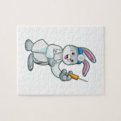 注射器で予防接種を受けているウサギ ジグソーパズル (横)