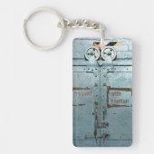 注意して青い灰色の工業用ドアで進む キーホルダー (正面)