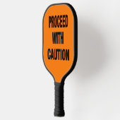 注意サインで進む ピックルボールラケット (左)