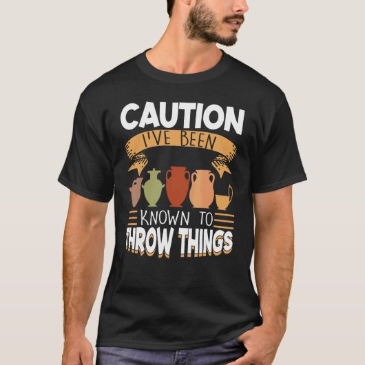 注意：陶器を投げることが知られている Tシャツ (正面)
