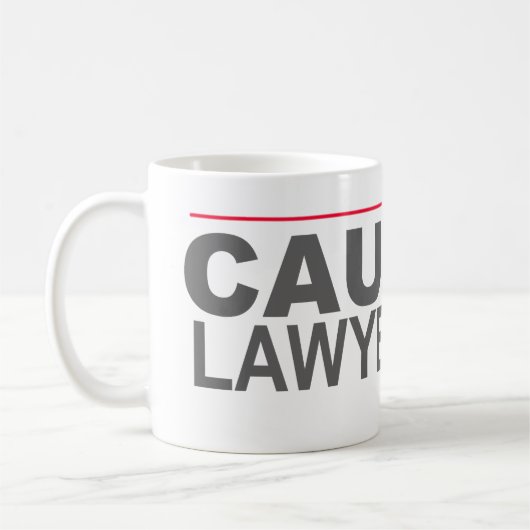 "注意LAWYERED" -- コーヒーマグカップ (左)