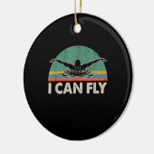 泳ぐと水着おもしろいが飛べる セラミックオーナメント (左)