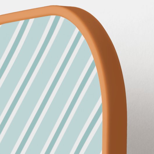 洗練されたティール(緑がかった色)グリーンとブルー対角ストライプの ピックルボールラケット (左詳細)