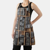 活版印刷の鉛型が入ったケース エプロン (インサイチュ)