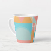 流体対称：カップでの抽象デザインの探索 カフェラテマグ (左アングル)