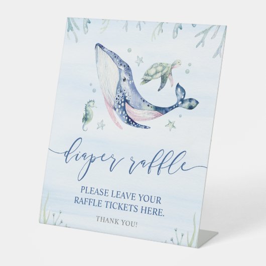 海おむつラッフルの下の男の子 台座サイン (正面)