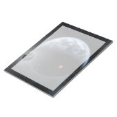 海が表面を覆う地球のような惑星。 ノートパッド (アングル)