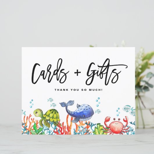 海のカードとギフトの看板の下の水色 (スタンド正面)